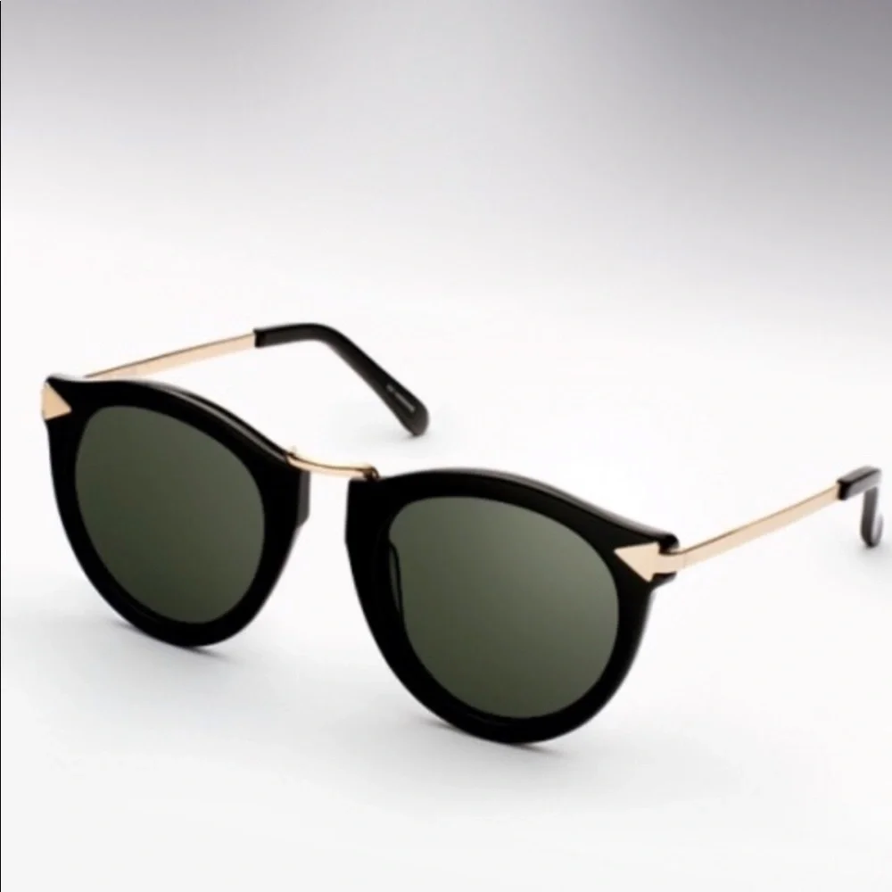 Karen Walker Black Frame Sunglasses with Gold Temples and Dark Green Lenses